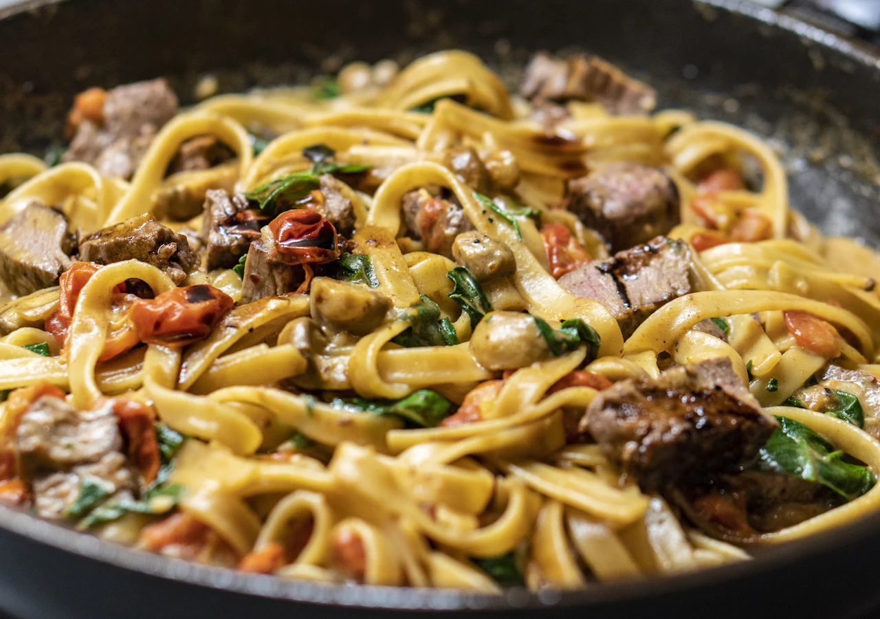 Sfeerbeeld: pasta met saus
